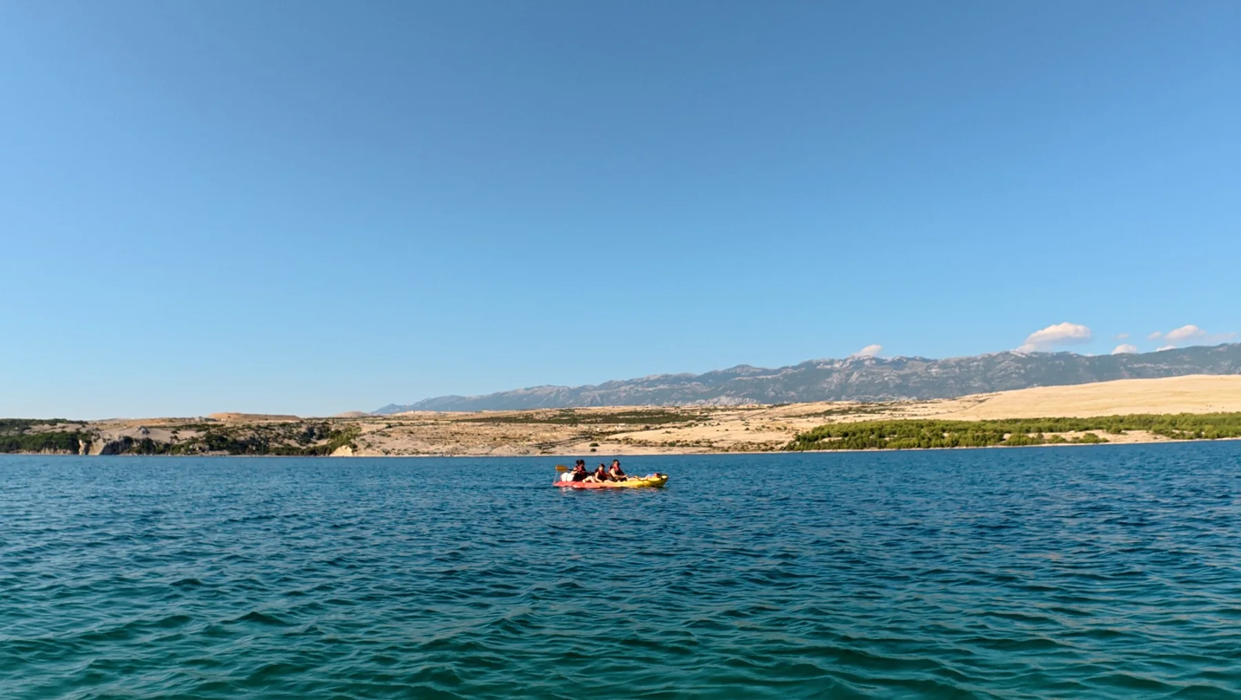 Kayak above crystal-clear water
