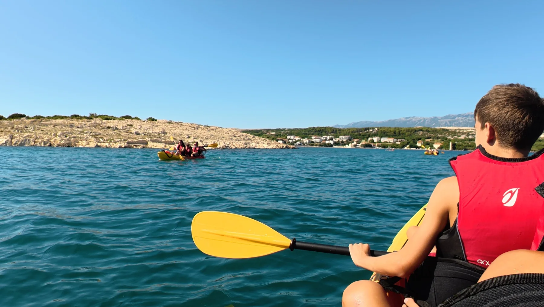 Kayak group on the sea